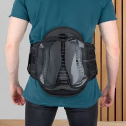 Ceinture de soutien lombaire avec mécanisme de serrage pour une pression uniforme au niveau de la colonne vertébrale