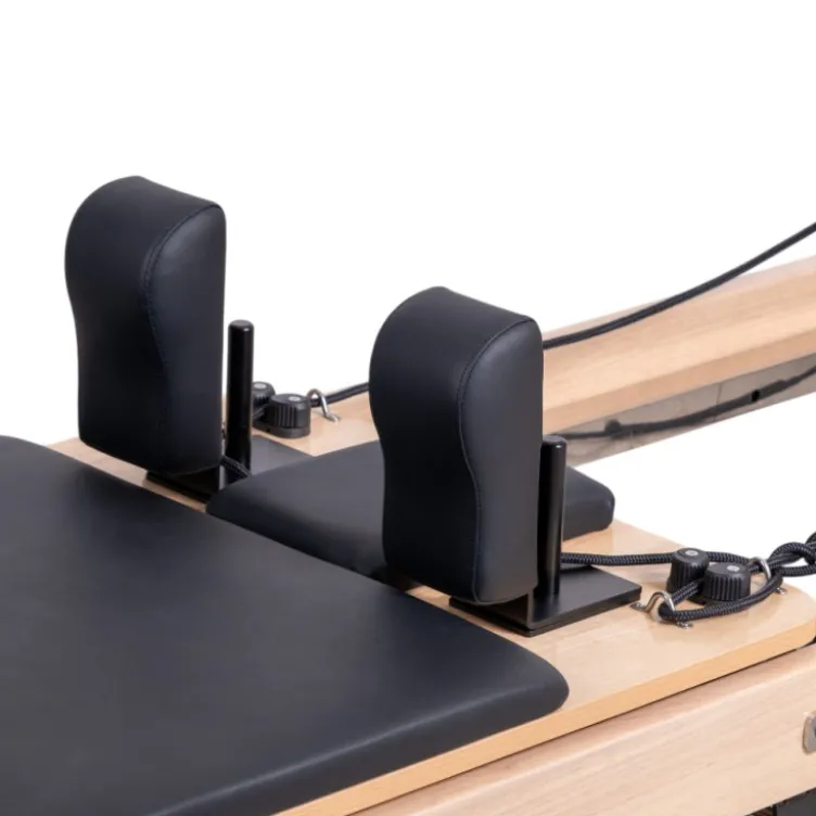 Pilates Reformer professionnel pliable en bois de chêne massif avec réglages multiples et résistance à ressorts