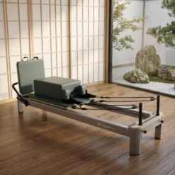 Pilates Reformer professionnel avec résistance à ressorts jusqu'à 79 kg et appui-tête ajustable - Pilates Box incluse