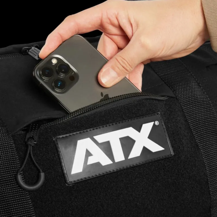 Sac de sport et de voyage d'une volume de 40 à 42 L avec compartiment à chaussures et bandoulière amovible