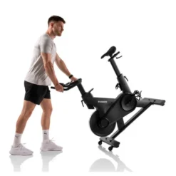 Vélo spinning de cardio Speed Race X avec roue d'inertie de 20 kg - 32 niveaux de résistance et écran HD