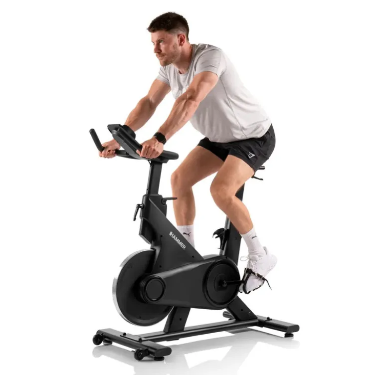 Vélo spinning de cardio Speed Race X avec roue d'inertie de 20 kg - 32 niveaux de résistance et écran HD